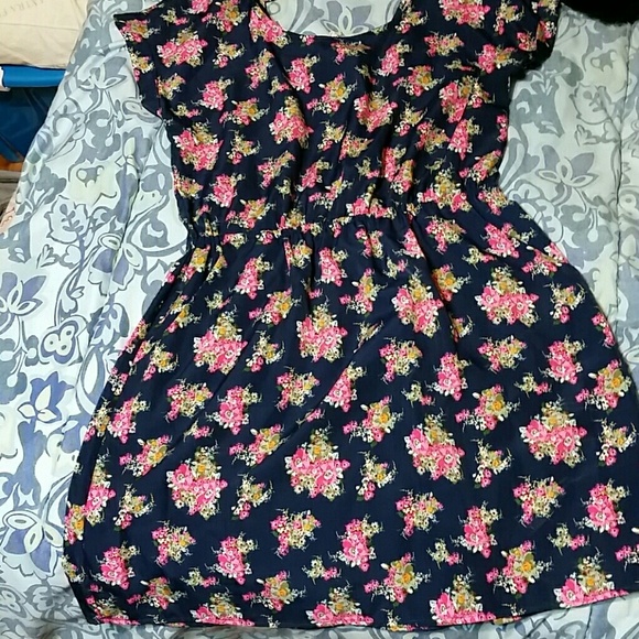 Super flirty and cute, cut out upper back dress