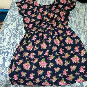 Super flirty and cute, cut out upper back dress