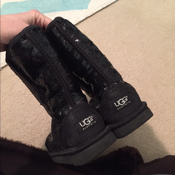 Worn black sparkly Uggs