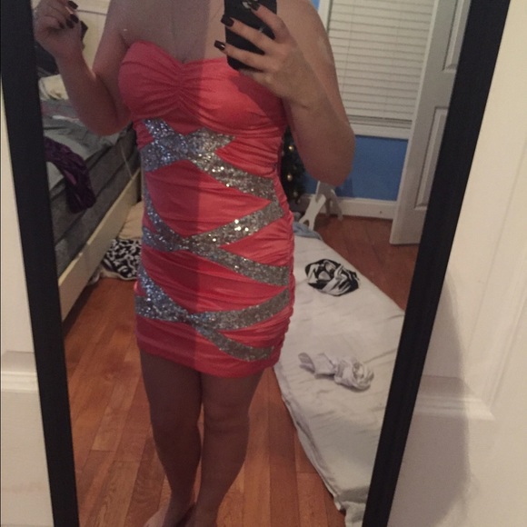 A coral pink formal dress
