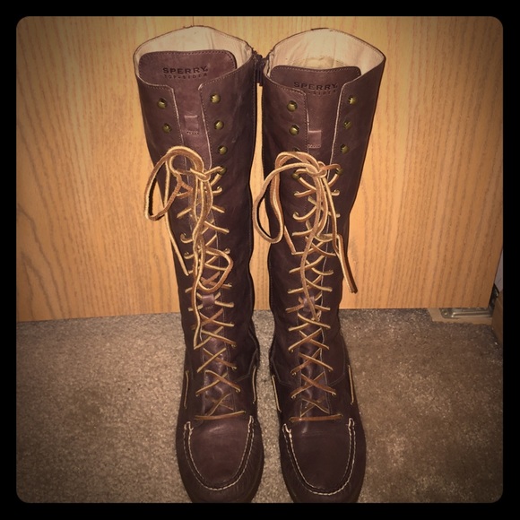 Brown, knee-high, Sperry Topsider boots.