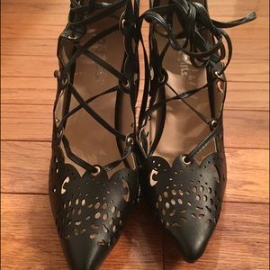 Never worn, red bottom, lace up heels.