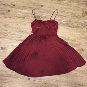 Burgundy dress.