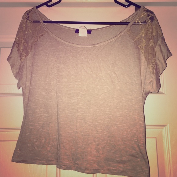 Cream colored, lacy top