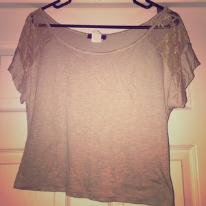 Cream colored, lacy top