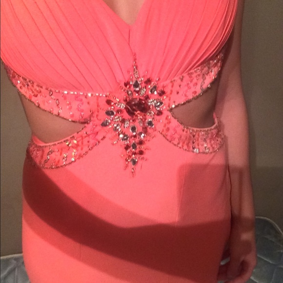Pink prom dress. Has a train. Worn for only 2 hour