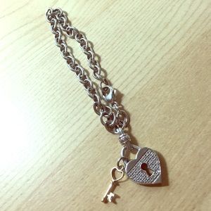 Diamond heart and key sterling silver bracelet