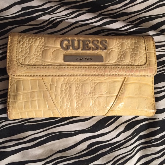 Guess wallet , yellow.