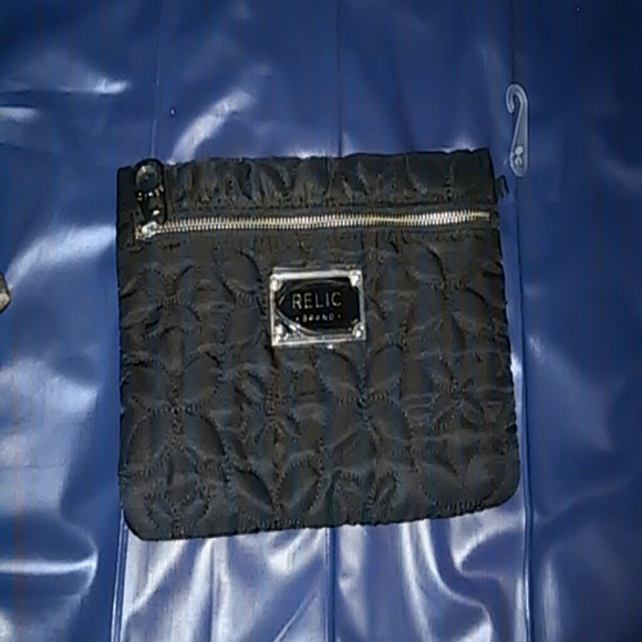 Relic carry all wristlet
