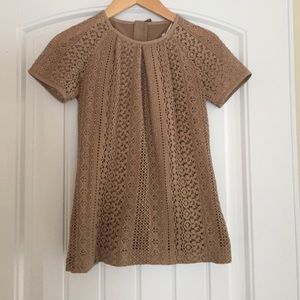 Beautiful lace top with back zip closure.