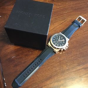 Michael Kors rose gold watch with silicon band.