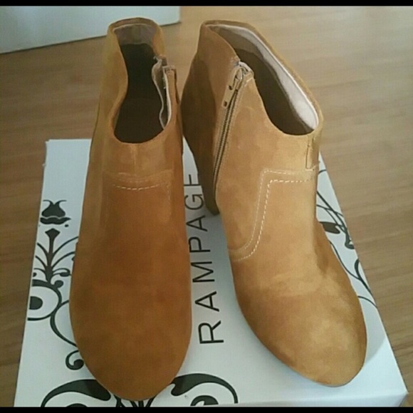 Aldo camel color boots.