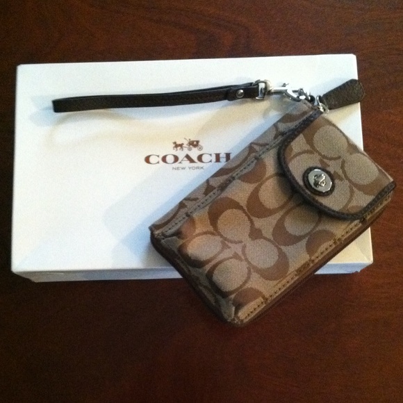 Classic signature new Coach wristlet.