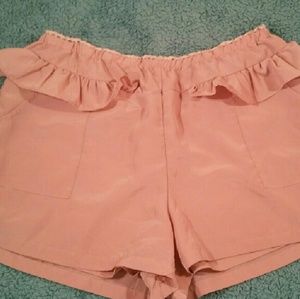 Pink ruffled shorts