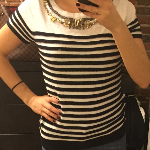 Short sleeved light sweater with jeweled neckline