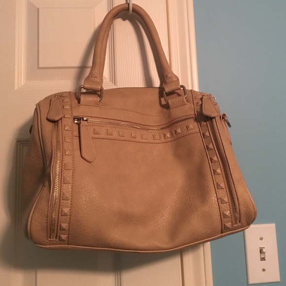 Nude colored purse.