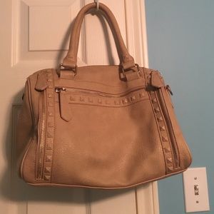 Nude colored purse.