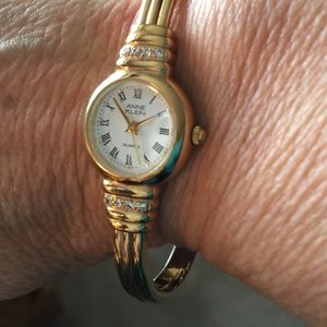 Gold tone bracelet watch