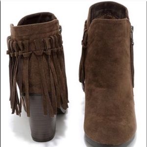 Brand new chocolate fringe boots.