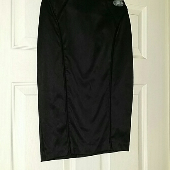 Satiny skirt with adorable detail.