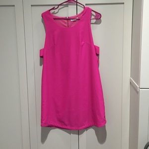 Hot pink dress with side cutout.