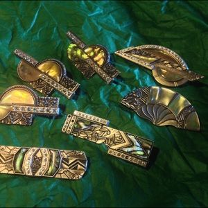 7 vintage signed Duri pins.