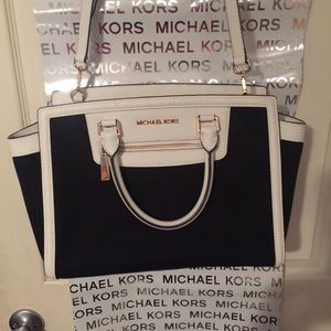 Michael Kors black and white trapeze bag