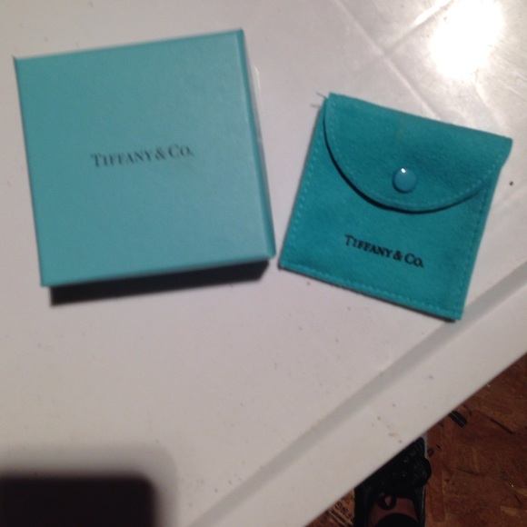 Empty Tiffany box with jewelry bag