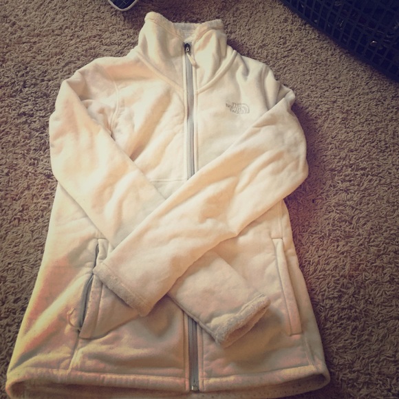 White, gently used north face jacket.