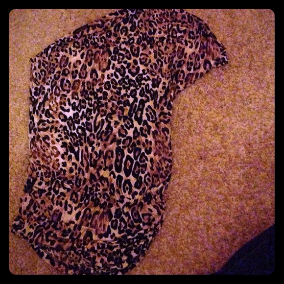 One shoulder cheetah print shirt.
