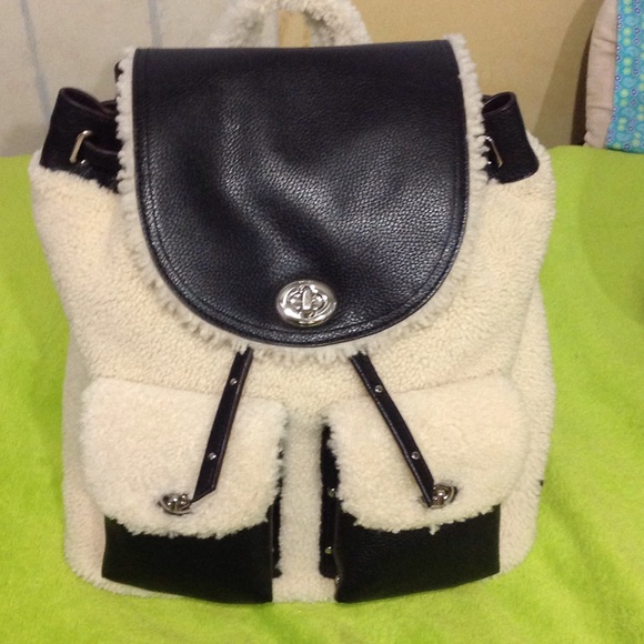 Coach Turnlock Tie Rucksack in Shearling