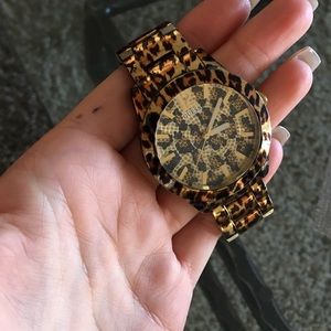 Guess cheetah gold watch