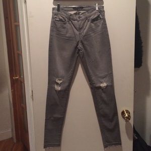 Light gray Jbrand skinny ripped denim