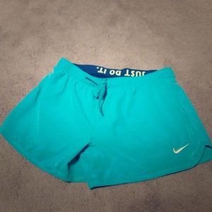 Nike shorts with built in compression shorts. M
