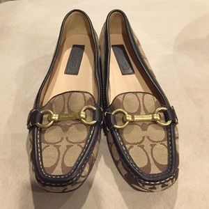 Brand new Coach loafers, never even worn.