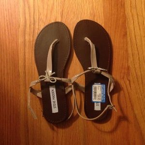 Steve Madden thong sandals.