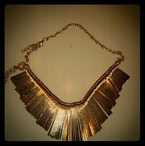 Gold colored necklace