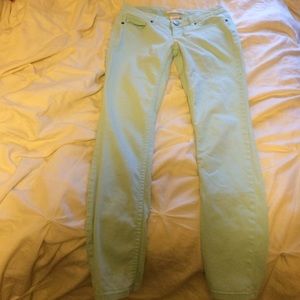 Mint green skinny jeans.