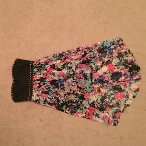 This is a multicolored high-low flows dress