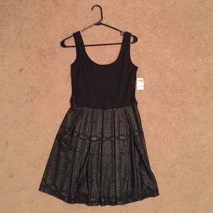 Simple, A-line black dress with pretty design