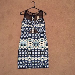 Sleeveless thigh length club dress w/ cutout back