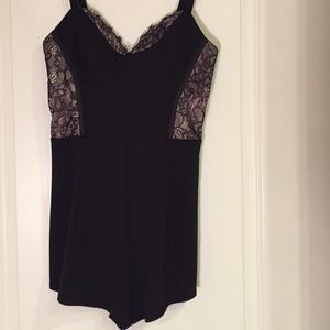 *SOLD* NWOT Arden B. Black romper with lace back.