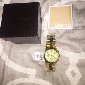 Brand new gold Michael kors watch