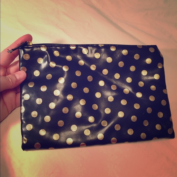 Black pouch with gold polka dots