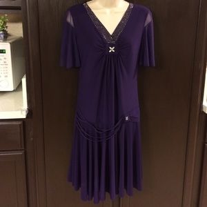 Purple midi dress with shiny bling crystals.V neck