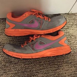 Neon orange and gray tennis shoe