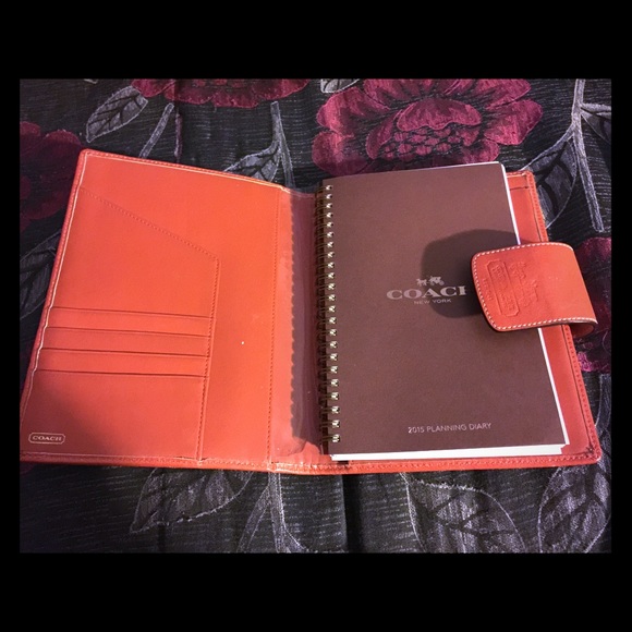 Authentic COACH day planner.
