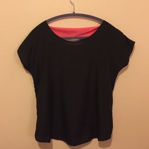 Black short sleeved shirt with gorgeous pink back