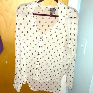 White blouse with skull print