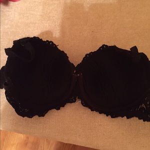 Black lace and light green Victoria secret bra.